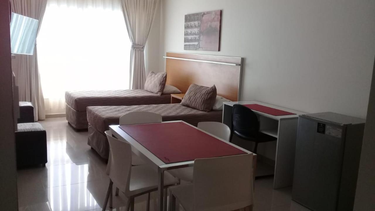 Illia 121 Apart Hotel Neuquén Oda fotoğraf